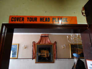 Figure 1: A sign at the Guru Nanak Gurdwara reminding visitors to cover their heads when in the gurdwara. © Clare Canning 2015